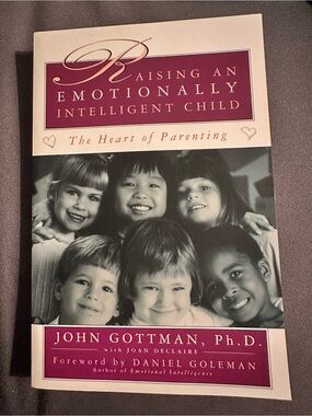 RAISING AN EMOTIONALLY INTELLIGENT CHILD John Gottman, Ph.D. with Joan Declaire